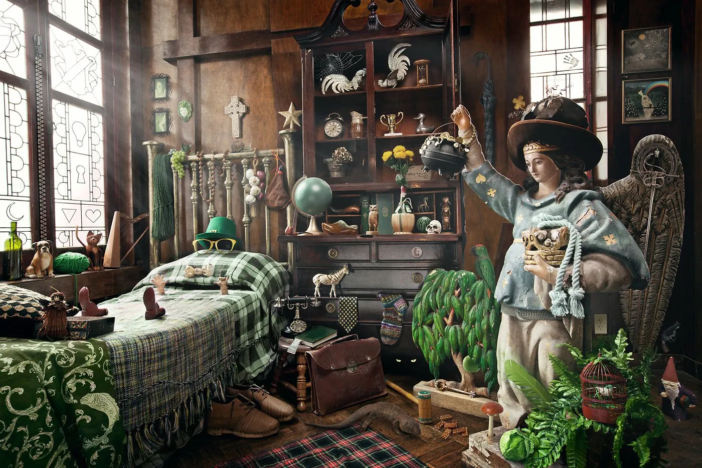 A room decorated with vintage objects and toys, with a figure of a woman in a hat, stuffed animals, plants, and antique furniture.